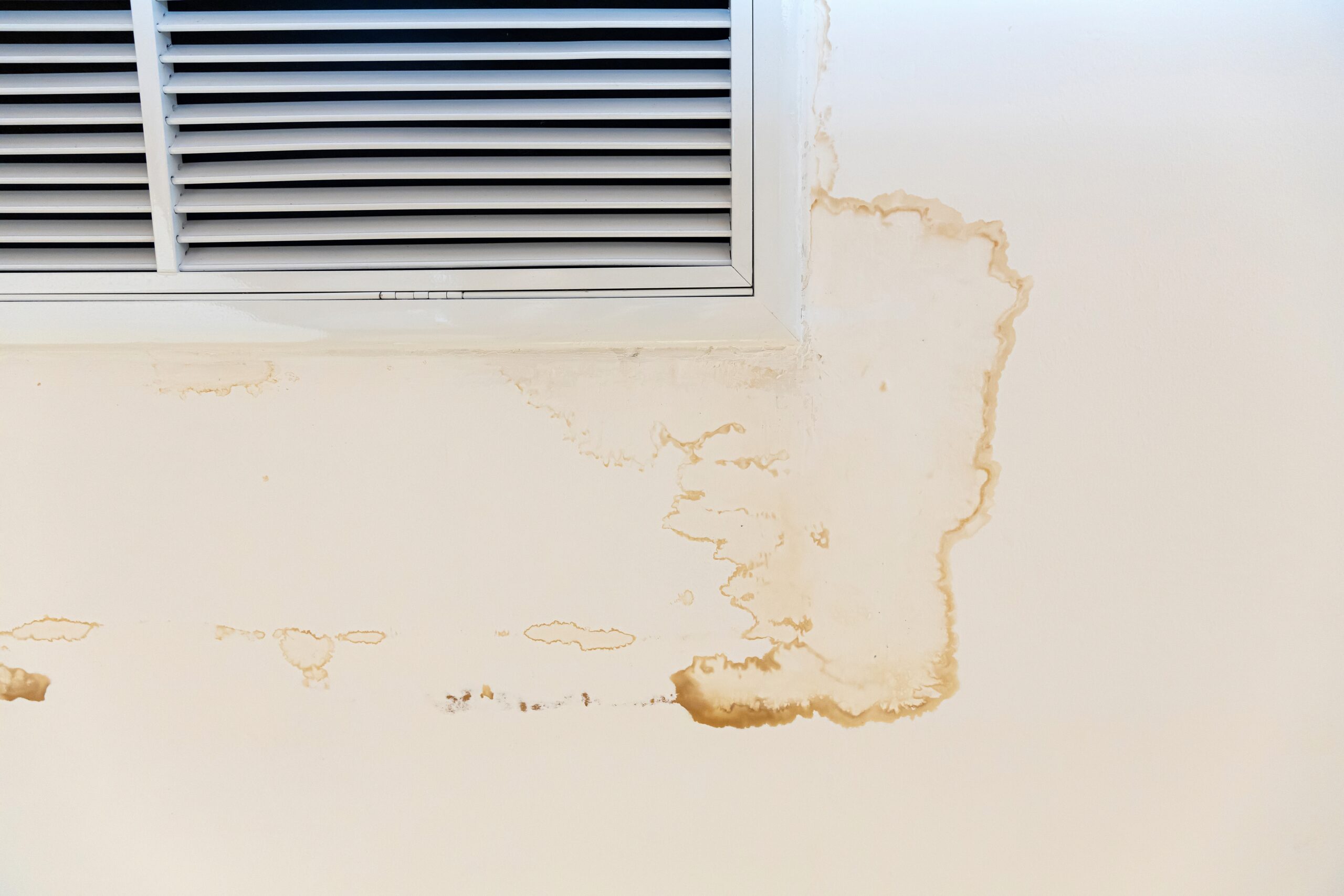 water stains around a vent on the ceiling